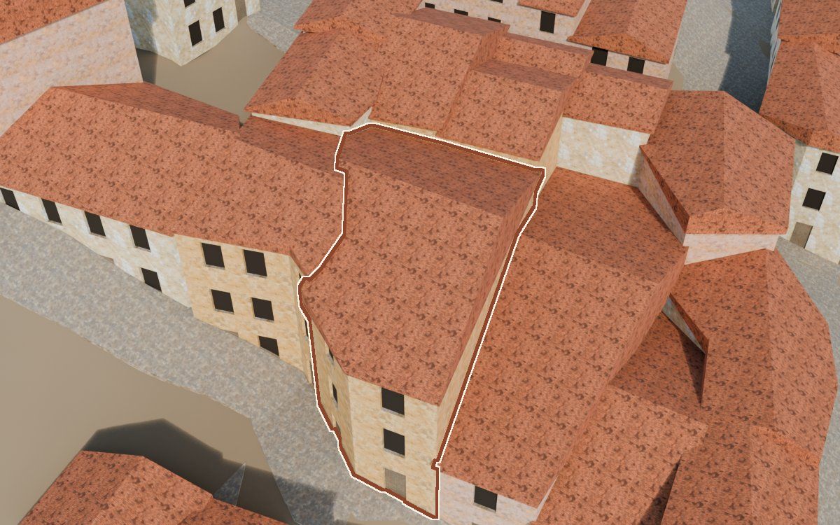 Manzana 41, n.º 15 y 16 en la reconstrucción 3D, vista desde el lado en que mejor se ve, con su contorno marcado en teja entre las casas de alrededor
