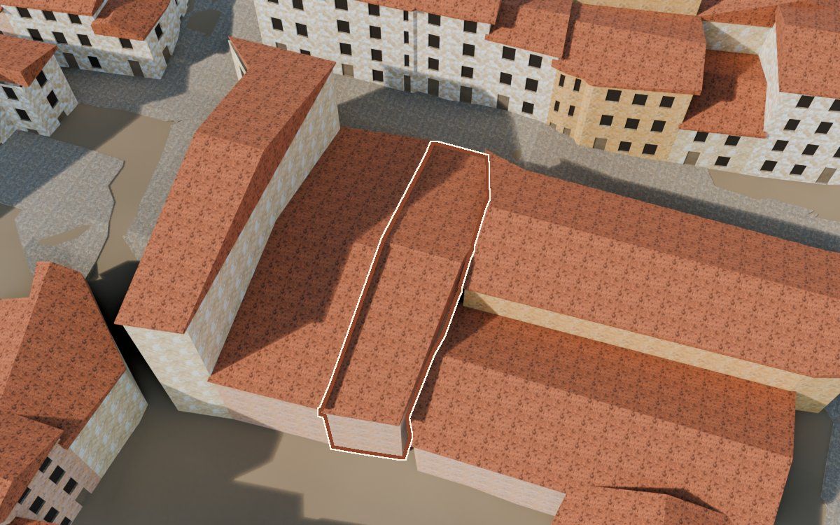Manzana 26, n.º 12 en la reconstrucción 3D, vista desde el lado en que mejor se ve, con su contorno marcado en teja entre las casas de alrededor